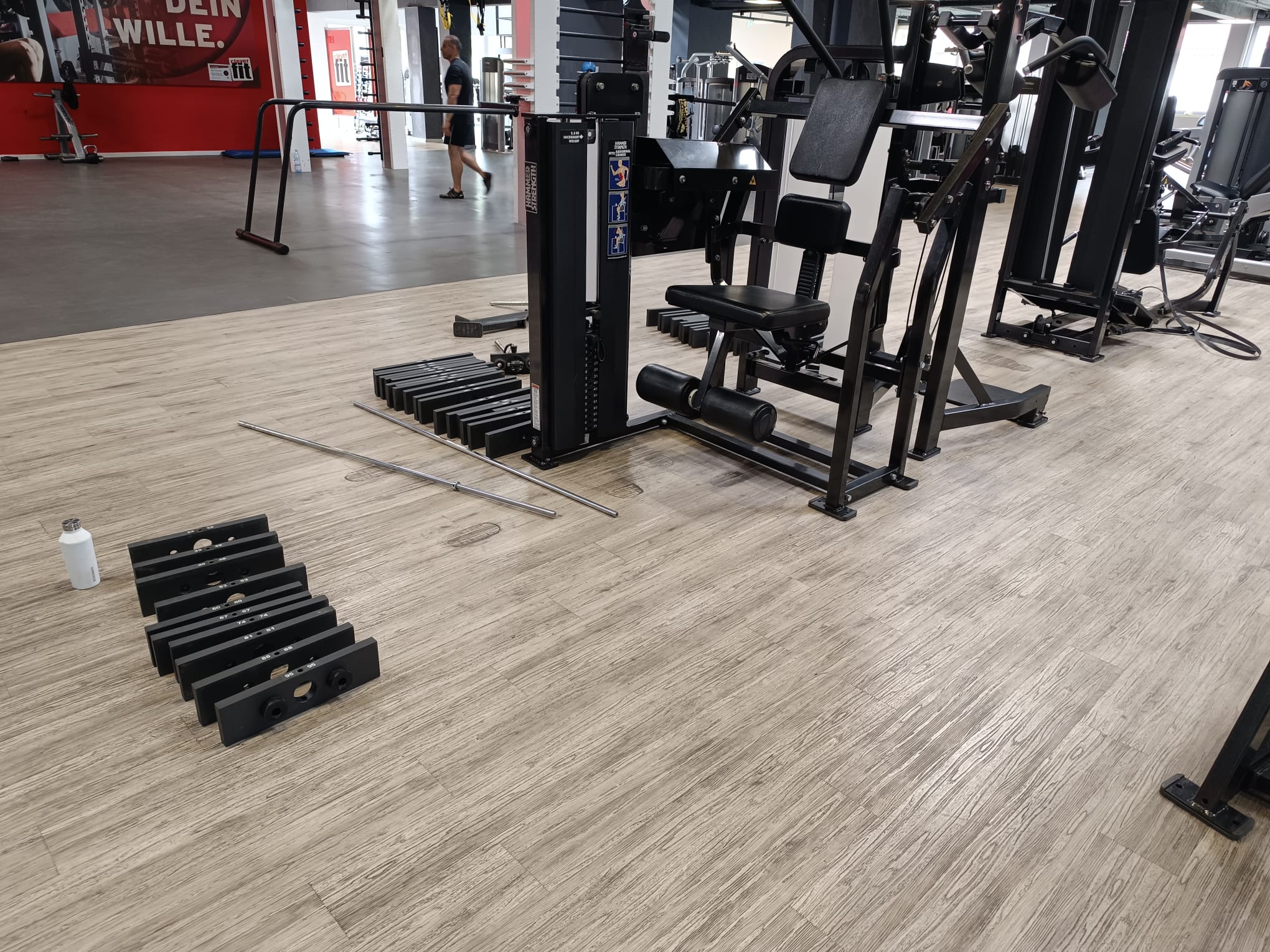Assembly of commercial strength fitness equipment in a gym