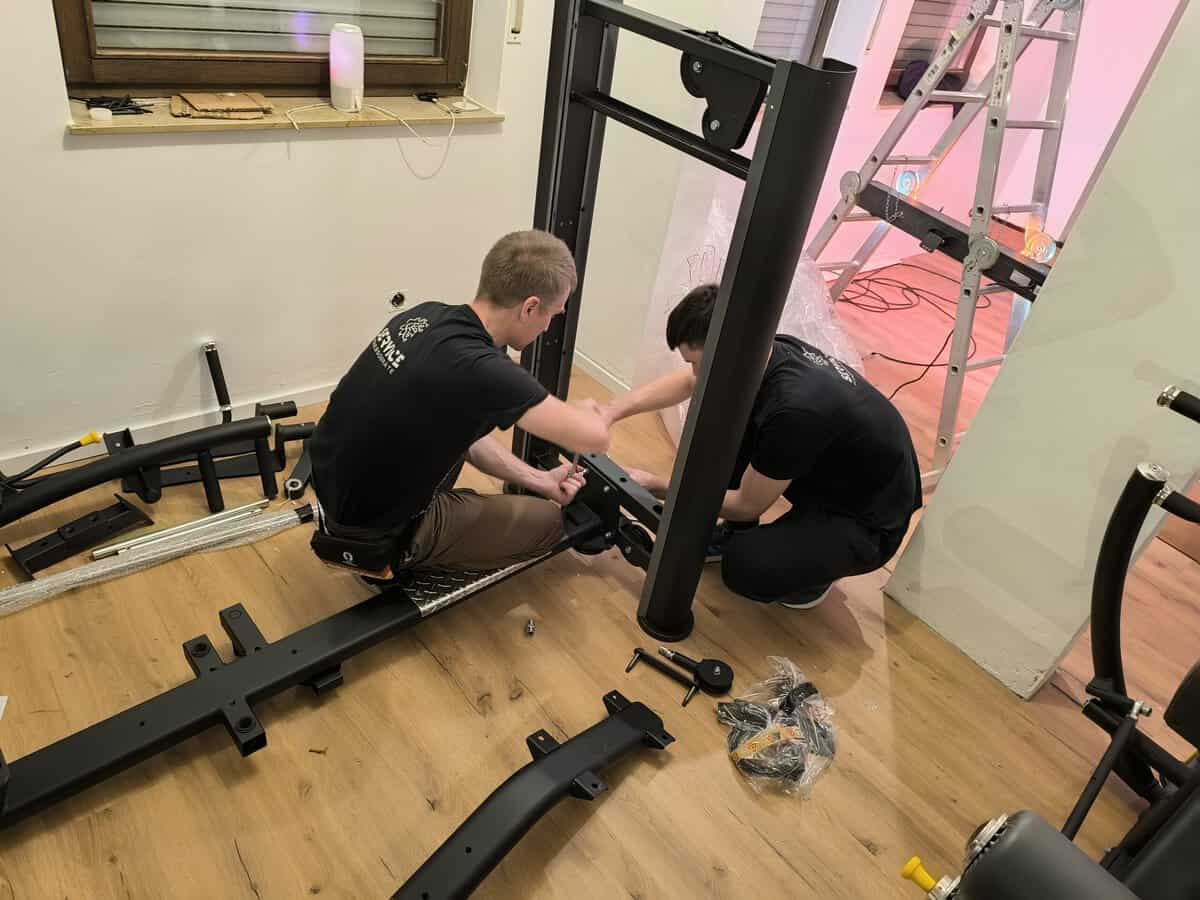 Gym Service technician working on commercial fitness equipment